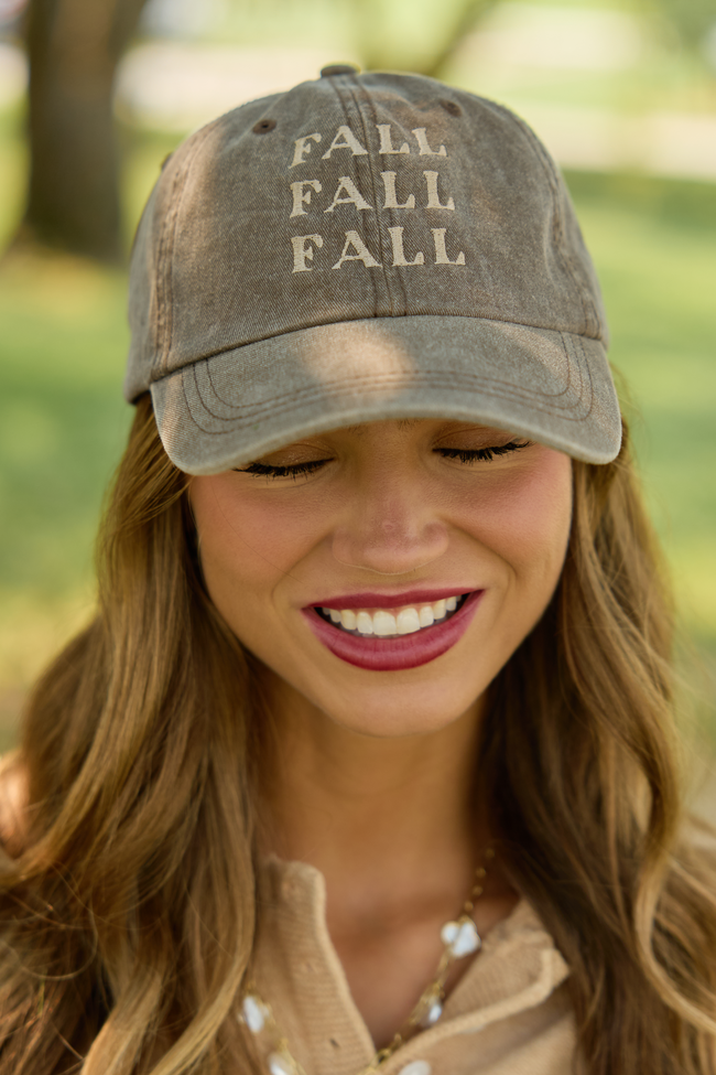 Brown washed cap with three stacked FALL words embroidered on the front.