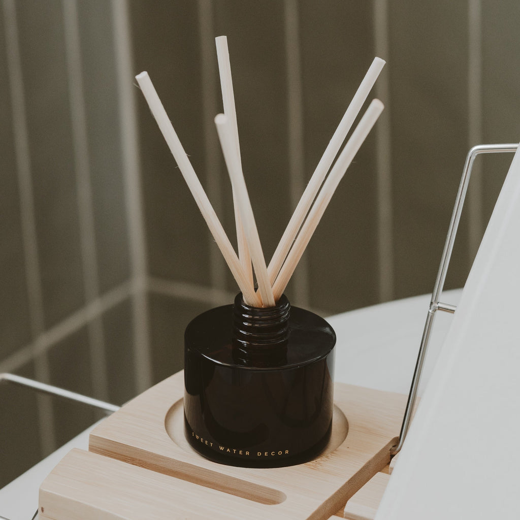 Hello Fall amber glass reed diffuser with apple cider scent